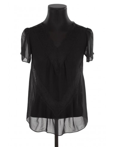 Top noir Sandro noir. Matière principale polyester. Taille 36. s'inspire de l'anatomie humaine